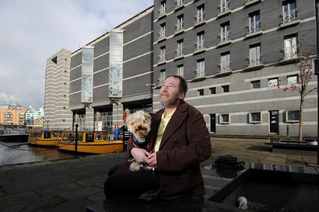 Hayden Harris with his dog Mollie at Leeds Dock