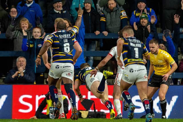Harry Newman scores the Rhinos' opening try.