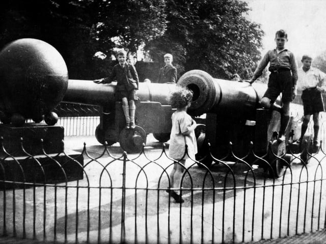 Children playing on Woodhouse Moors Sevastapol cannons in 1928.