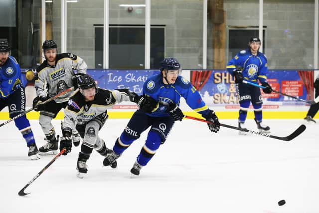 Caly Robertson,right, battles for possession on a frustrating night at Elland Road against Milton Keynes Lightning. Picture courtesy of Andy Bourke/Podium Prints.