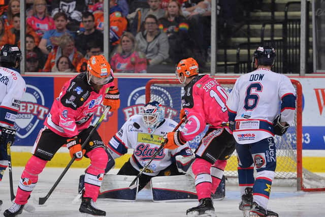Sheffield Steelers' John Armstrong, left and Tanner Eberle find their path to the Dundee Stars' goal blocked. Picture courtesy of Dean Woolley.