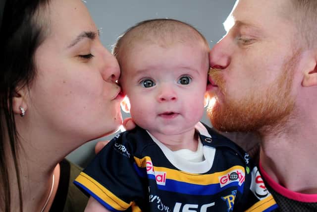 Six-month-old Maddison Holt from Gipton with mum Natasha and dad Rob. Photo by Simon Hulme.