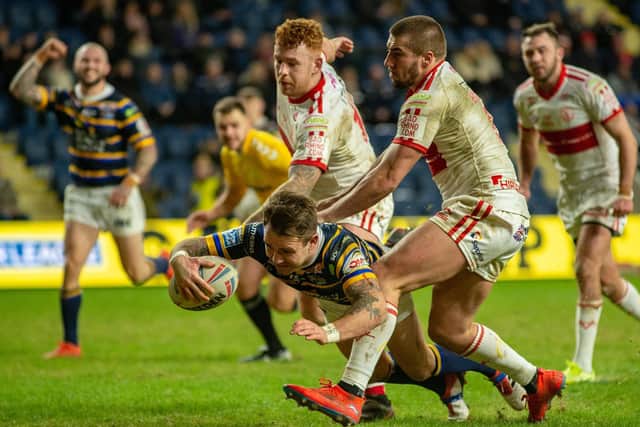Luke Briscoe, left, celebrates as Richie Myler touches down. Picture by Bruce Rollinson.