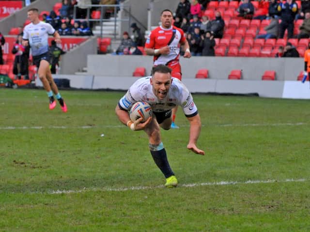 Luke Gale scores for Leeds Rhinos at Salford. Picture by Steve Riding.