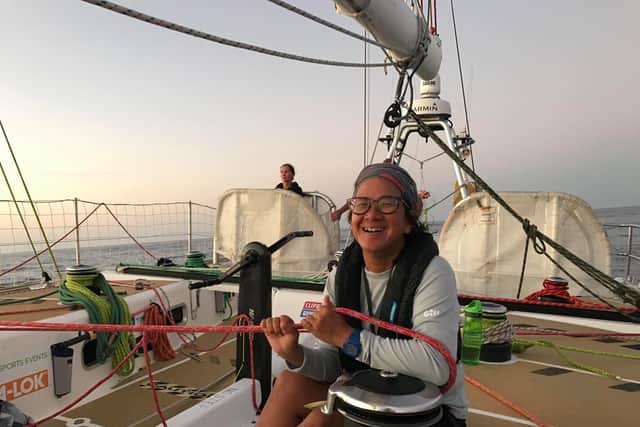 Theresia Cadwallader trimming the spinnaker on the Dare to Lead yacht as the  Clipper Round the World Race continues.