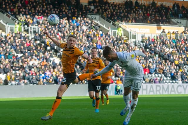 Tyler Roberts heading in his second goal for Leeds United at Hull City (Pic: Tony Johnson)