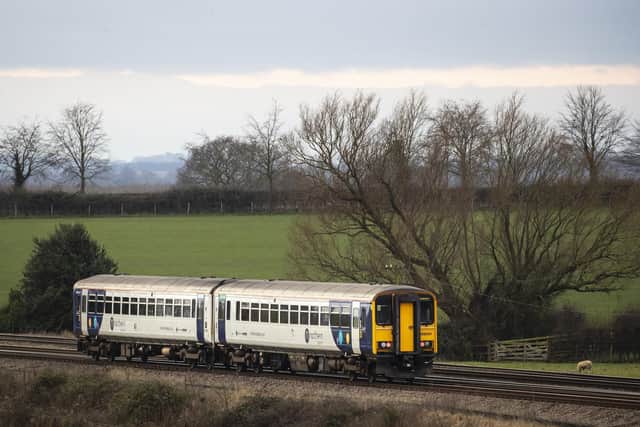 A Northern train rolls through the North Yorkshire countryside. Pic: PA