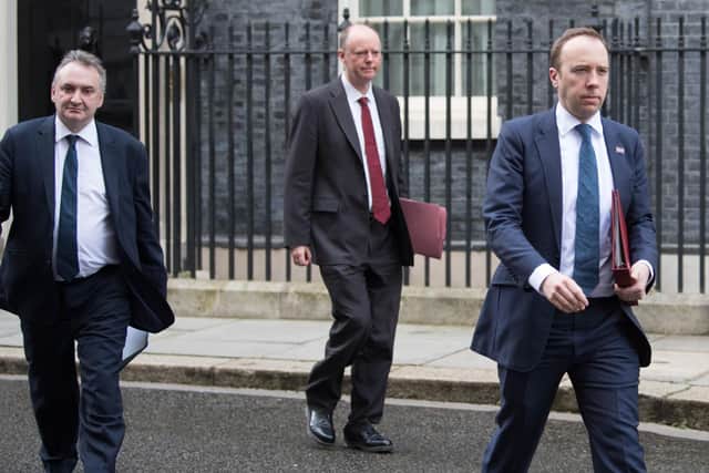 Health Secretary Matt Hancock (right), and Chief Medical Officer Chris Whitty (centre) leaving the Cabinet Office in London after a Cobra meeting (Photo: Stefan Rousseau/PA Wire)