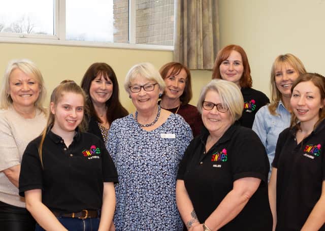 SNAPS president Anne Gait, centre, with charity staff members. Picture: Templars Photography