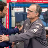 Leeds United head coach Marcelo Bielsa greets Huddersfield Town boss Danny Cowley. (Image: Bruce Rollinson)