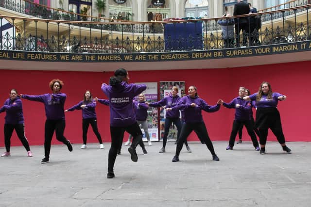 Leeds Girls Can stage a flashmob dance at Leeds Corn Exchange.