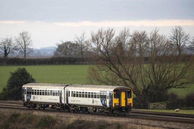 A Northern train rolls through the Yorkshire countryside.  Credit: PA