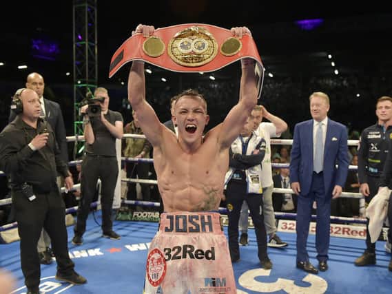 UNFORGETTABLE: Promoter Frank Warren looks on as Josh Warrington celebrates becoming IBF featherweight champion of the world after defeating Lee Selby at Elland Road in May 2018. Picture by Steve Riding.