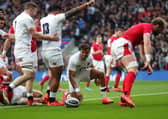 England's Anthony Watson (centre) celebrates his sides first try of the game at Twickenham. Picture: David Davies/PA