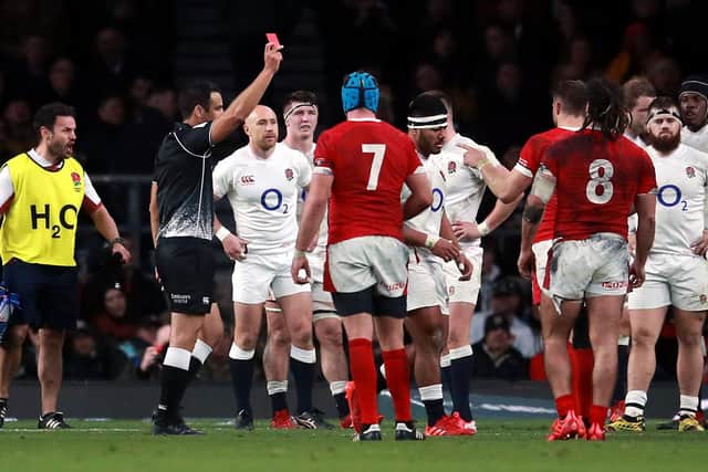 England's Manu Tuilagi is shown a red card by referee Ben O'Keeffe during the Guinness Six Nations match (Adam Davy/PA Wire)