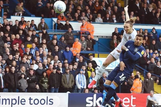Luke Ayling crashing home a wonderful volley against Huddersfield Town, to put Leeds United 1-0 up (Pic: Jonathan Gawthorpe)