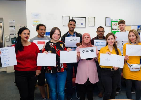 Members of Learning Partnership’s ESOL (English to Speakers of Other Languages) class say ‘hello’ in a variety of languages.