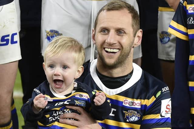 Ex-Rhino Rob Burrow with son Jackson. Picture: Steve Riding