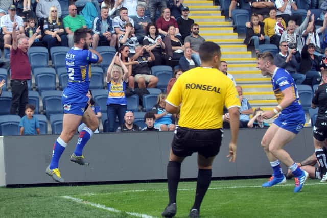 Tom Briscoe celebrates with Harry Newman.