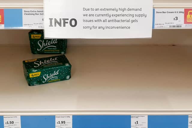 A view of empty shelves as hygiene products are almost sold out in a supermarket in Ashford, Kent (Photo: Gareth Fuller/PA Wire).