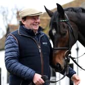 Trainer Nicky Henderson and Altior. PIC: Bradley Collyer/PA Wire