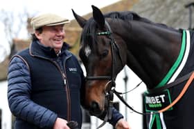 Trainer Nicky Henderson and Altior. PIC: Bradley Collyer/PA Wire
