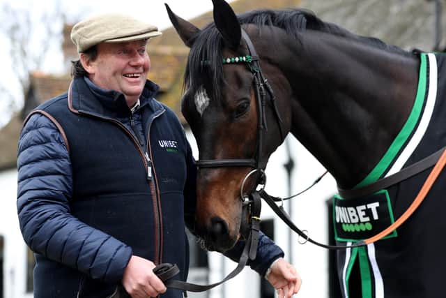 Trainer Nicky Henderson and Altior. PIC: Bradley Collyer/PA Wire