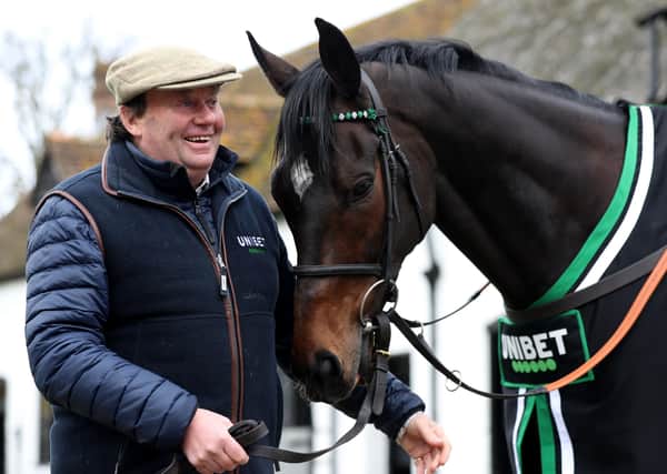 Trainer Nicky Henderson and Altior. PIC: Bradley Collyer/PA Wire