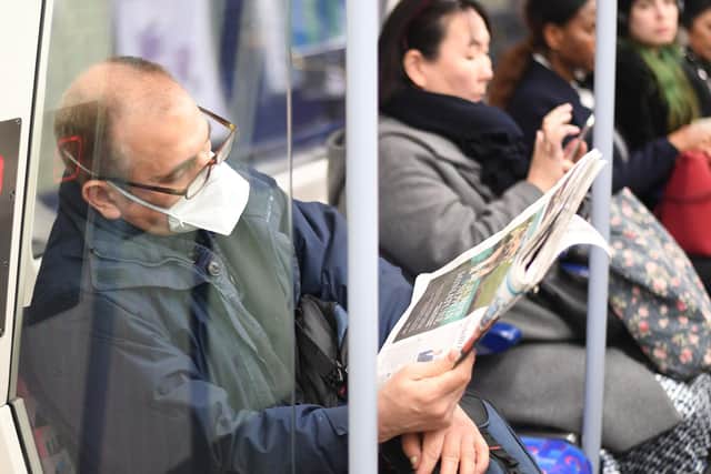 A man wears a mask on public transport (Photo: PA).