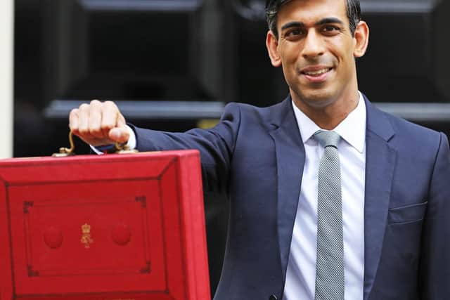 Chancellor Rishi Sunak poses for the cameras outside Downing Street. Pic: PA