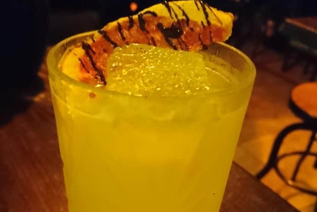 The Absolute Waterman, topped with a grapefruit chocolate crisp, is one of the bar's own creations.