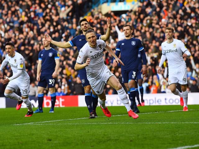 HUGE SUPPORT: Luke Ayling fires home Leeds United's opener in last weekend's 2-0 win against Huddersfield Town in front of packed Elland Road stands. Picture by Jonathan Gawthorpe.
