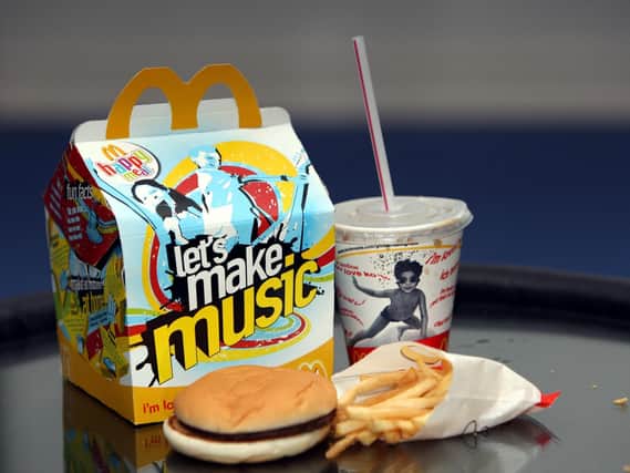 McDonald's is set to replace its famous Happy Meal toys with non-plastic versions from next year.