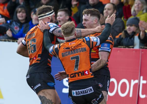 END GAME? Castleford Tigers' Jake Trueman celebrates his try in the win over St Helens on Sunday, one of the last games of rugby league to be played until at least early April because of the coronavirus crisis. Picture: Tony Johnson