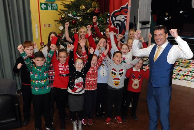 Mr Dyson celebrating the school's extraordinary turnaround in 2018.