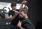 Alex Foxter prepares to say goodbye to his flowing locks. Picture courtesy of Castleford Tigers.