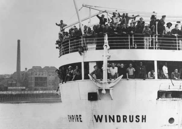 The ex-troopship 'Empire Windrush' arriving at Tilbury Docks from Jamaica, with 482 Jamaicans on board, emigrating to Britain. (Getty Images)