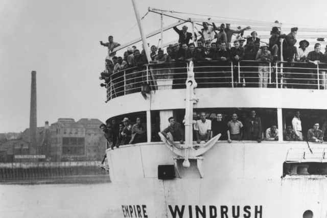 The ex-troopship 'Empire Windrush' arriving at Tilbury Docks from Jamaica, with 482 Jamaicans on board, emigrating to Britain.  (Getty Images)
