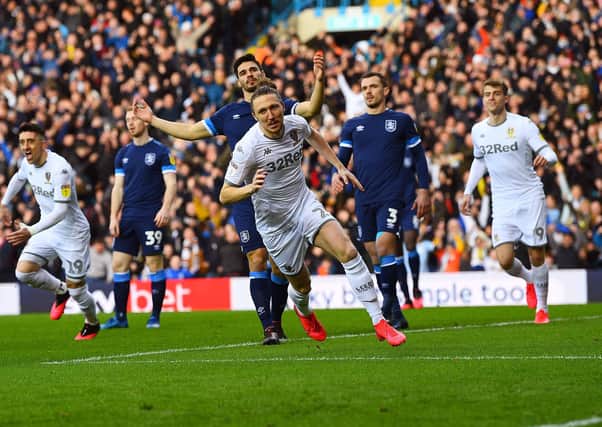 DELAYED: Leeds United's Luke Ayling celebrates his goal against Yorkshire rivals Huddersfield Town in the recent derby. Picture: Jonathan Gawthorpe