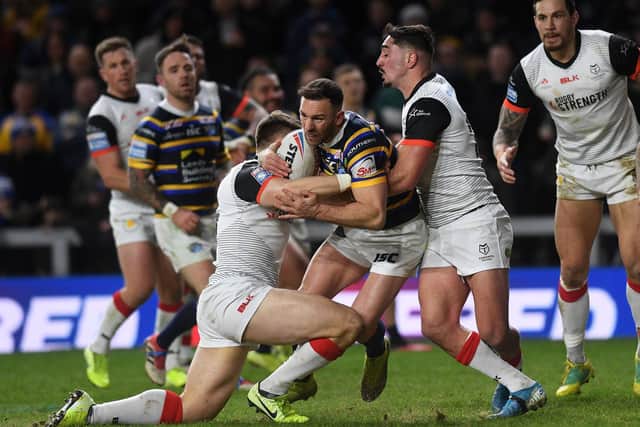 Luke Gale carries the ball for Leeds against Toronto, Rhinos' final game before rugbyleague was shut down.