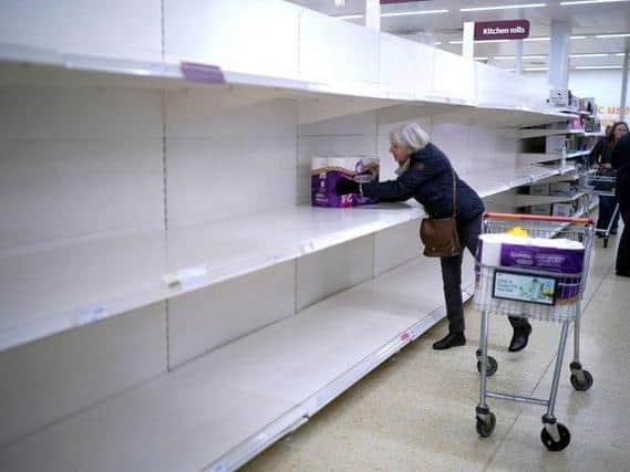 Shoppers across the UK have been urged to "be responsible" and not panic buy. PA.