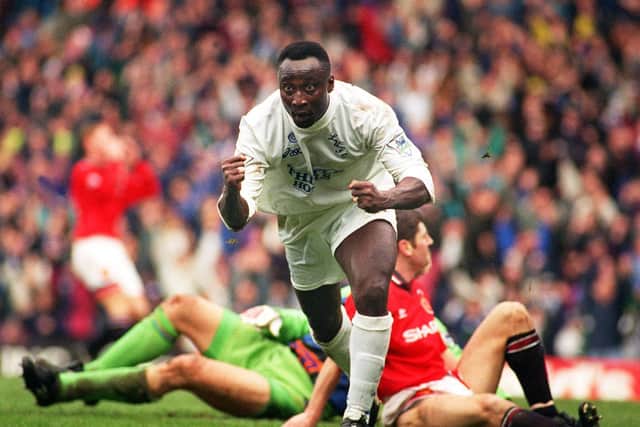 MEMORIES: Tony Yeboah leaves Peter Schmeichel and Dennis Irwin grounded after scoring Leeds United's second goal in the 3-1 win against Manchester United at Elland Road on Christmas Eve 1995. Picture by Mark Bickerdike.
