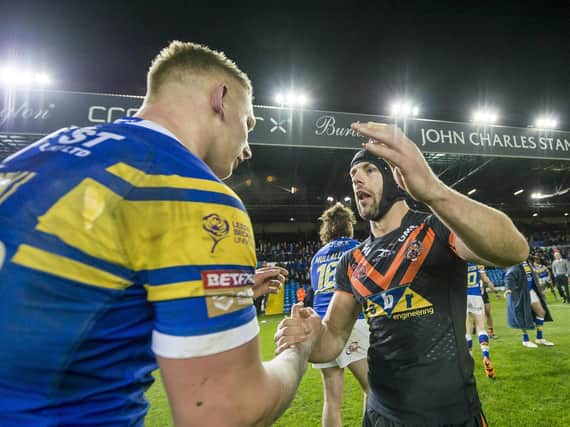 Luke Gale, top, is congratulated by Mikolaj Oledzki after his drop goal saw Castleford pip Leeds in 2018.