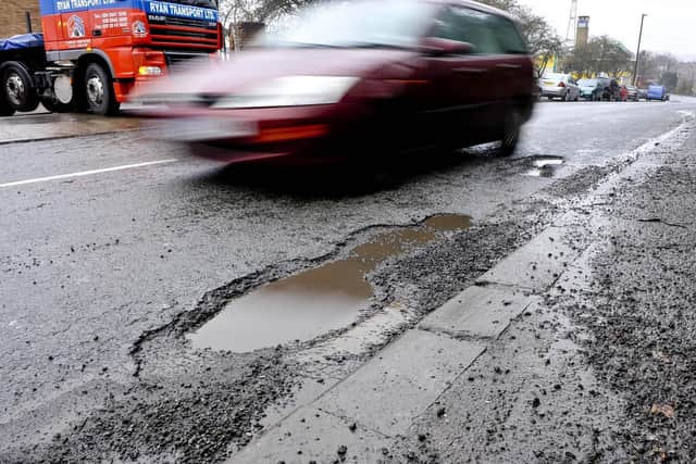 The number of potholes repaired in England and Wales fell by a fifth in the past 12 months amid a decline in road maintenance budgets, new figures show. Pic; PA