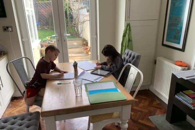 Kathryn Louise shared a picture of her children hard at work, as schools shut to all but children of keyworkers