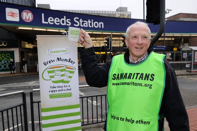 Samaritans volunteer Bob Howe highlighting 'Brew Monday' at Leeds Station.