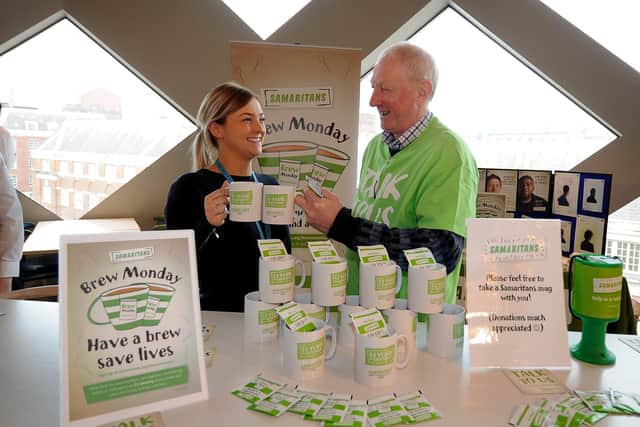 Samaritans hosting Brew Monday at the John Lewis Store, Leeds. Bob Howe is pictured with Kathryn Yeadon in January 2019. Picture by Simon Hulme.