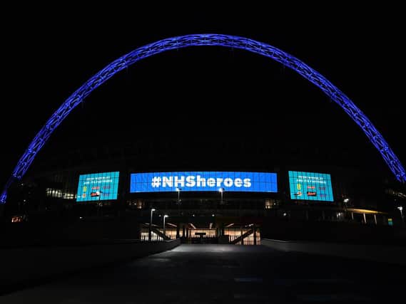 The Wembley Stadium arch was transformed to recognise the efforts of the National Health Service.
