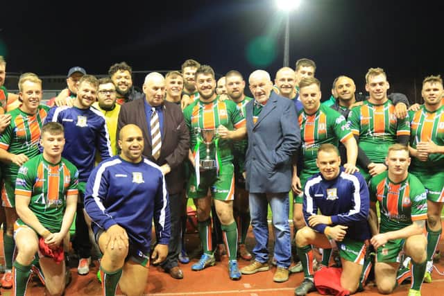 Ken Sykes and the Hunslet team celebrate victory over Leeds Rhinos in the pre-season Harry Jepson Trophy tie. Picture by Craig Hawkhead.