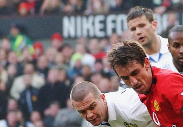 Manchester United's Gary Neville in action against Leeds United. (Image: Getty)